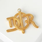 Christian Dior ‘Carriage Monogram Brooch’