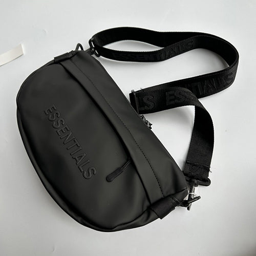 Essentials Embossed Letter Cross Bag